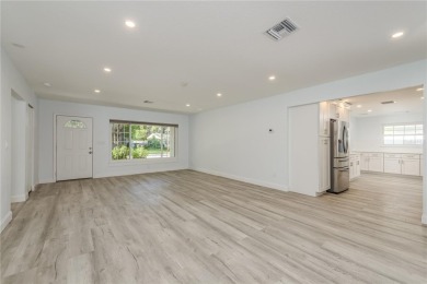 Welcome to 1152 Jackmar Road, a completely renovated 2000sf+ on The Dunedin Country Club in Florida - for sale on GolfHomes.com, golf home, golf lot