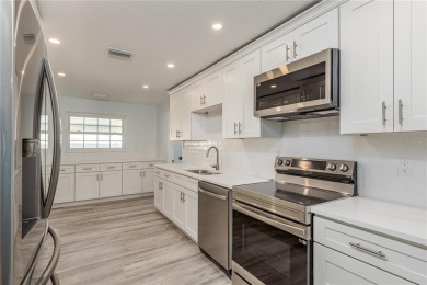 Welcome to 1152 Jackmar Road, a completely renovated 2000sf+ on The Dunedin Country Club in Florida - for sale on GolfHomes.com, golf home, golf lot