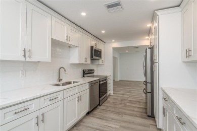 Welcome to 1152 Jackmar Road, a completely renovated 2000sf+ on The Dunedin Country Club in Florida - for sale on GolfHomes.com, golf home, golf lot
