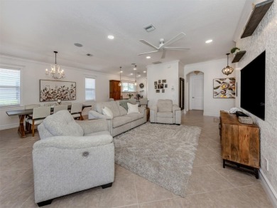 Experience the Florida lifestyle in this elegant Donatello model on Venetian Golf and River Club in Florida - for sale on GolfHomes.com, golf home, golf lot