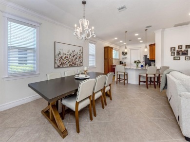 Experience the Florida lifestyle in this elegant Donatello model on Venetian Golf and River Club in Florida - for sale on GolfHomes.com, golf home, golf lot