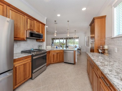 Experience the Florida lifestyle in this elegant Donatello model on Venetian Golf and River Club in Florida - for sale on GolfHomes.com, golf home, golf lot