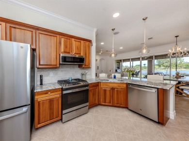 Experience the Florida lifestyle in this elegant Donatello model on Venetian Golf and River Club in Florida - for sale on GolfHomes.com, golf home, golf lot