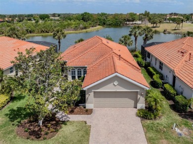 Experience the Florida lifestyle in this elegant Donatello model on Venetian Golf and River Club in Florida - for sale on GolfHomes.com, golf home, golf lot
