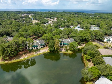 Welcome to lakefront living in the heart of Bluewater Bay! This on Golf Club at Bluewater Bay Resort in Florida - for sale on GolfHomes.com, golf home, golf lot
