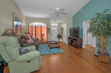 Welcome to 9713 Sweeping View Dr, a remarkable oasis nestled on Timber Greens Country Club in Florida - for sale on GolfHomes.com, golf home, golf lot