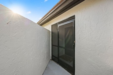 Discover the perfect blend of comfort and convenience within the on PGA National Golf Club in Florida - for sale on GolfHomes.com, golf home, golf lot