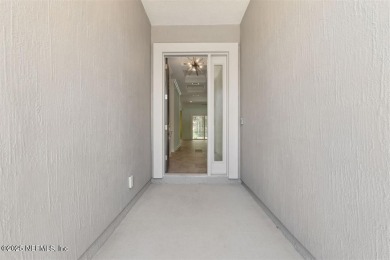 This luxury four bedroom, three bath upgraded home on a wooded on Amelia National Golf and Country Club in Florida - for sale on GolfHomes.com, golf home, golf lot