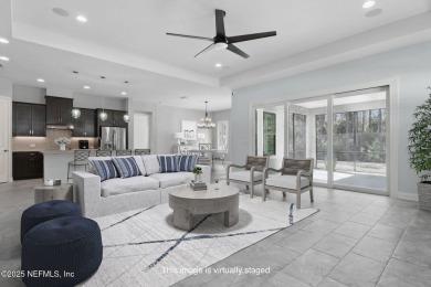 This luxury four bedroom, three bath upgraded home on a wooded on Amelia National Golf and Country Club in Florida - for sale on GolfHomes.com, golf home, golf lot