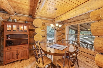 An extraordinary log home surrounded by mature trees and on Red Lodge Golf Club in Montana - for sale on GolfHomes.com, golf home, golf lot