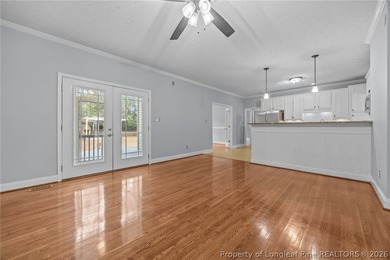 Enjoy outdoor living at its finest with a screened porch on Carolina Lakes Country Club in North Carolina - for sale on GolfHomes.com, golf home, golf lot