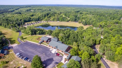 Adorable and inviting, this 2-bedroom, 1-bath Beaver Creek cabin on The Loon Golf Resort in Michigan - for sale on GolfHomes.com, golf home, golf lot