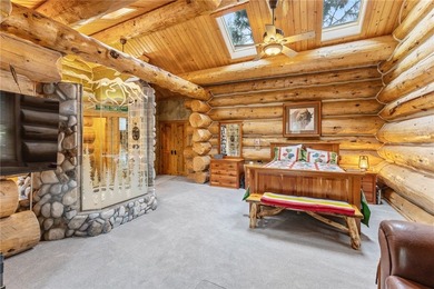 An extraordinary log home surrounded by mature trees and on Red Lodge Golf Club in Montana - for sale on GolfHomes.com, golf home, golf lot