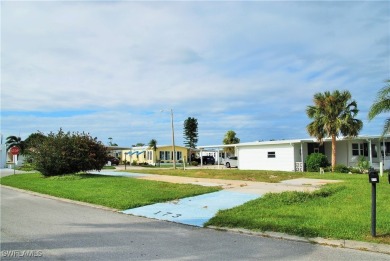 Rare oversized corner lot with golf course views! This expansive on Six Lakes Country Club in Florida - for sale on GolfHomes.com, golf home, golf lot