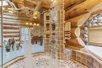 An extraordinary log home surrounded by mature trees and on Red Lodge Golf Club in Montana - for sale on GolfHomes.com, golf home, golf lot