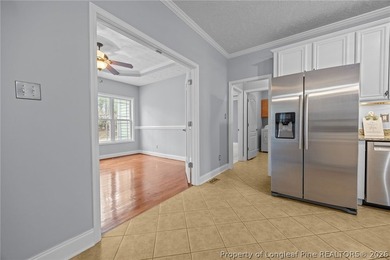 Enjoy outdoor living at its finest with a screened porch on Carolina Lakes Country Club in North Carolina - for sale on GolfHomes.com, golf home, golf lot