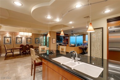 Perched high above the vibrant city, this luxury high-rise condo on Badlands Golf Club in Nevada - for sale on GolfHomes.com, golf home, golf lot