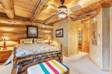 An extraordinary log home surrounded by mature trees and on Red Lodge Golf Club in Montana - for sale on GolfHomes.com, golf home, golf lot