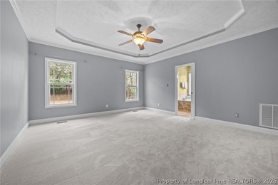 Enjoy outdoor living at its finest with a screened porch on Carolina Lakes Country Club in North Carolina - for sale on GolfHomes.com, golf home, golf lot