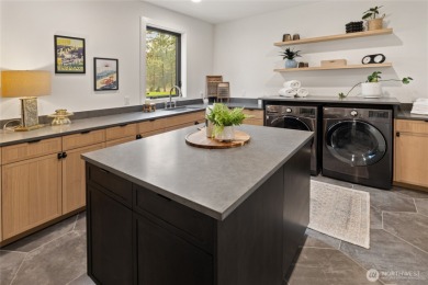 Experience refined mountain living in this custom-built smart on Suncadia Resort in Washington - for sale on GolfHomes.com, golf home, golf lot
