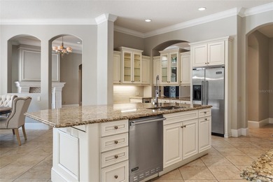 Experience refined, single-level living in this exceptional on The Golden Bear Club At Keenes Pointe in Florida - for sale on GolfHomes.com, golf home, golf lot