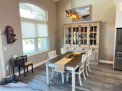 Experience the perfect blend of space, sophistication, and on Pinemoor West Golf Club in Florida - for sale on GolfHomes.com, golf home, golf lot