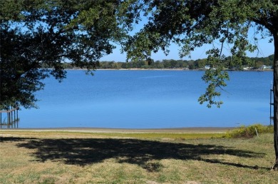 ABSOLUTELY BREATHTAKING VIEWS AND SUNSETS FROM THIS BEAUTIFUL on Cedar Creek Country Club in Texas - for sale on GolfHomes.com, golf home, golf lot