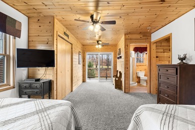 Discover this inviting Beaver Creek Resort cabin, offering the on The Loon Golf Resort in Michigan - for sale on GolfHomes.com, golf home, golf lot
