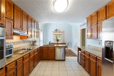Welcome to this beautifully updated 4 bedroom, 3 bath on Canongate Golf Club in Georgia - for sale on GolfHomes.com, golf home, golf lot