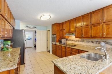 Welcome to this beautifully updated 4 bedroom, 3 bath on Canongate Golf Club in Georgia - for sale on GolfHomes.com, golf home, golf lot