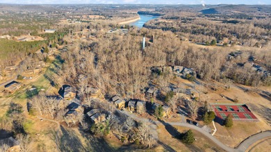 Adorable well cared for upper level 2 bed 2 bath condo located on Woodson Bend Resort in Kentucky - for sale on GolfHomes.com, golf home, golf lot