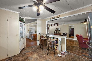 Nestled in the sought after 55+ community of Imperial Terrace on Bay Tree Golf Course in Florida - for sale on GolfHomes.com, golf home, golf lot