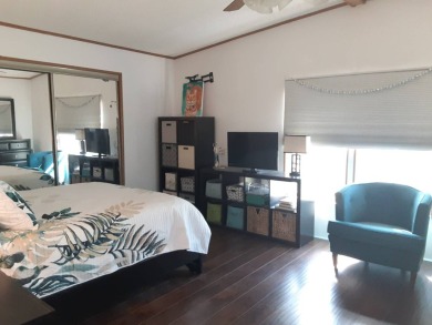 This waterfront 1792 sq ft 3 bedroom manufactured home is in 55+ on Schalamar Creek Golf and Country Club in Florida - for sale on GolfHomes.com, golf home, golf lot