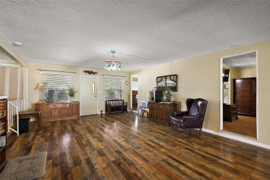 Nestled in the sought after 55+ community of Imperial Terrace on Bay Tree Golf Course in Florida - for sale on GolfHomes.com, golf home, golf lot
