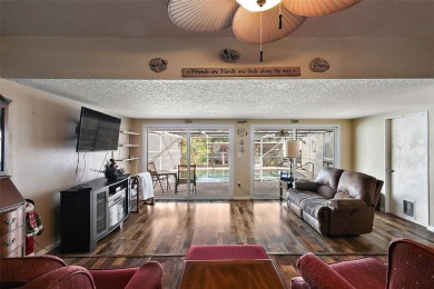 Nestled in the sought after 55+ community of Imperial Terrace on Bay Tree Golf Course in Florida - for sale on GolfHomes.com, golf home, golf lot