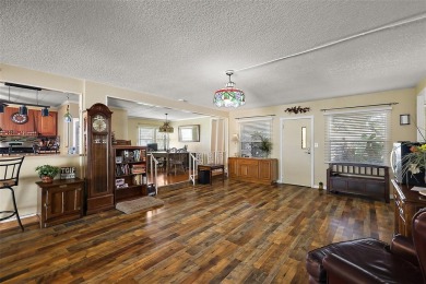 Nestled in the sought after 55+ community of Imperial Terrace on Bay Tree Golf Course in Florida - for sale on GolfHomes.com, golf home, golf lot