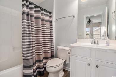 Set on a desirable corner lot, this spacious 4-bedroom, 3-bath on Myrtle Beach National Golf Course in South Carolina - for sale on GolfHomes.com, golf home, golf lot