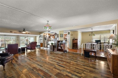 Nestled in the sought after 55+ community of Imperial Terrace on Bay Tree Golf Course in Florida - for sale on GolfHomes.com, golf home, golf lot