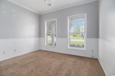 Set on a desirable corner lot, this spacious 4-bedroom, 3-bath on Myrtle Beach National Golf Course in South Carolina - for sale on GolfHomes.com, golf home, golf lot