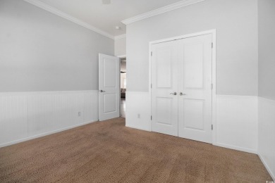 Set on a desirable corner lot, this spacious 4-bedroom, 3-bath on Myrtle Beach National Golf Course in South Carolina - for sale on GolfHomes.com, golf home, golf lot