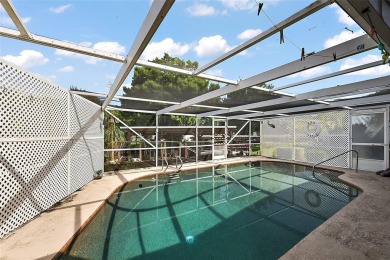 Nestled in the sought after 55+ community of Imperial Terrace on Bay Tree Golf Course in Florida - for sale on GolfHomes.com, golf home, golf lot