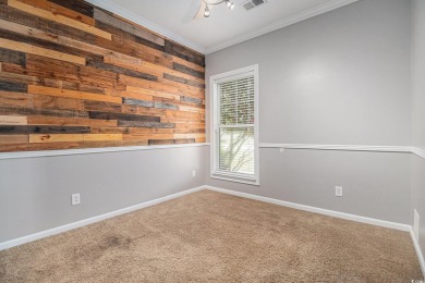Set on a desirable corner lot, this spacious 4-bedroom, 3-bath on Myrtle Beach National Golf Course in South Carolina - for sale on GolfHomes.com, golf home, golf lot