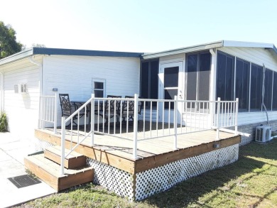 This waterfront 1792 sq ft 3 bedroom manufactured home is in 55+ on Schalamar Creek Golf and Country Club in Florida - for sale on GolfHomes.com, golf home, golf lot