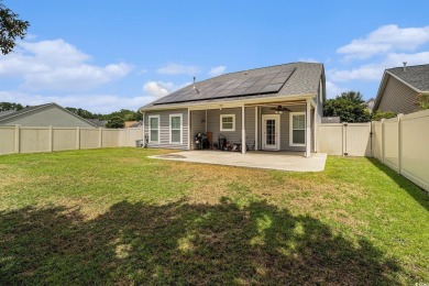 Set on a desirable corner lot, this spacious 4-bedroom, 3-bath on Myrtle Beach National Golf Course in South Carolina - for sale on GolfHomes.com, golf home, golf lot