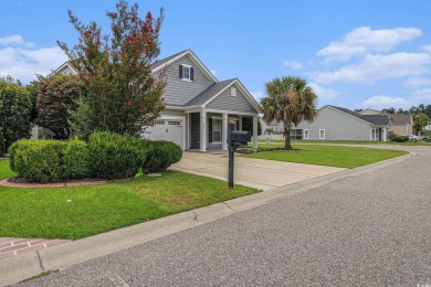 Set on a desirable corner lot, this spacious 4-bedroom, 3-bath on Myrtle Beach National Golf Course in South Carolina - for sale on GolfHomes.com, golf home, golf lot
