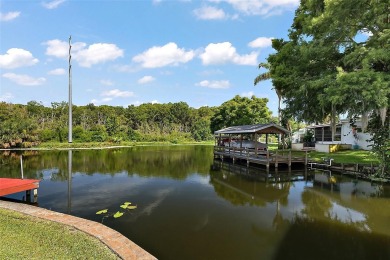 Nestled in the sought after 55+ community of Imperial Terrace on Bay Tree Golf Course in Florida - for sale on GolfHomes.com, golf home, golf lot