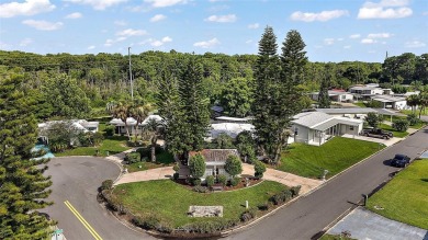 Nestled in the sought after 55+ community of Imperial Terrace on Bay Tree Golf Course in Florida - for sale on GolfHomes.com, golf home, golf lot