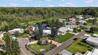 Nestled in the sought after 55+ community of Imperial Terrace on Bay Tree Golf Course in Florida - for sale on GolfHomes.com, golf home, golf lot