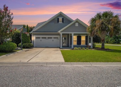 Set on a desirable corner lot, this spacious 4-bedroom, 3-bath on Myrtle Beach National Golf Course in South Carolina - for sale on GolfHomes.com, golf home, golf lot