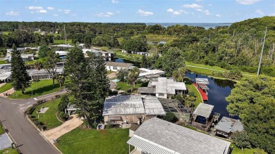 Nestled in the sought after 55+ community of Imperial Terrace on Bay Tree Golf Course in Florida - for sale on GolfHomes.com, golf home, golf lot